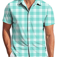 Man wearing a turquoise and white plaid shirt on a white background