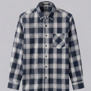 Plaid shirt on a hanger against a white background