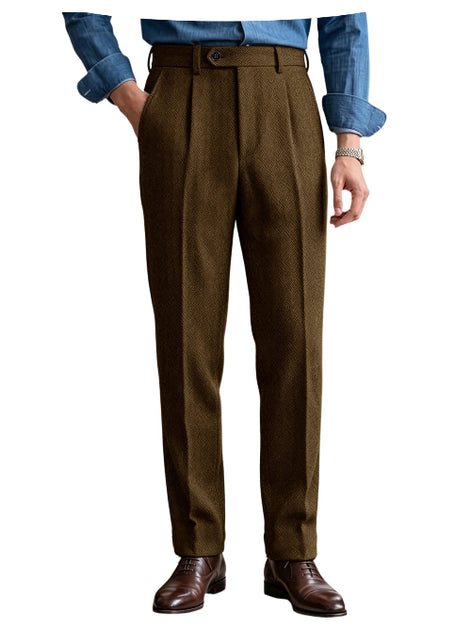 Dark brown herringbone pleated suit trousers shown on a white background