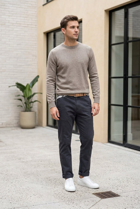 A pair of dark slate blue chino pants shown flat against a solid white background.