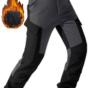 Gray and black cargo pants shown at an angle with a flame graphic overlay