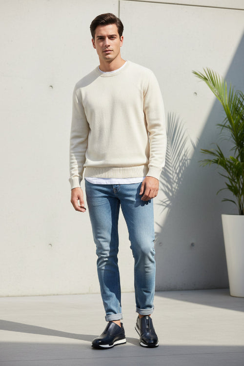 Pair of navy blue shoes with white soles on a light gray background