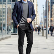 Brown leather dress shoes being worn on a wooden floor