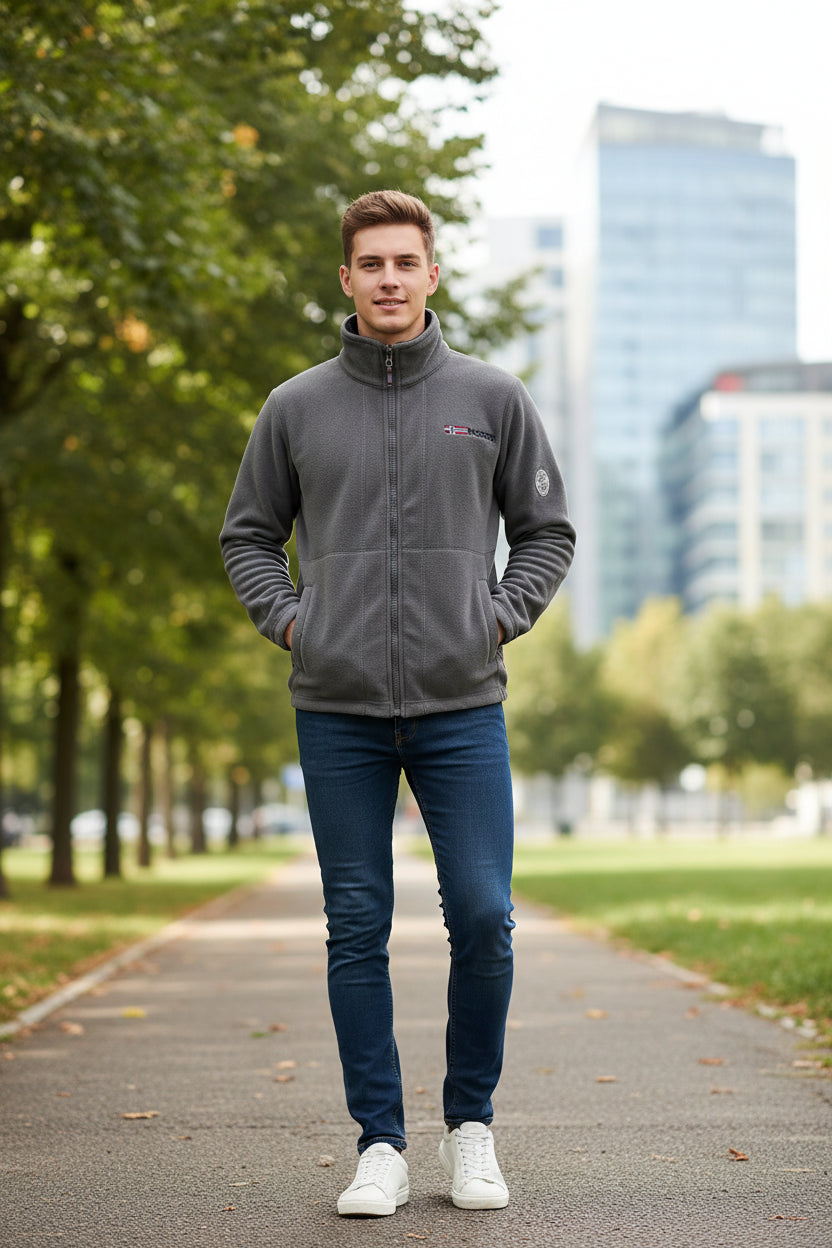Gray fleece jacket with brand logos on a light gray background