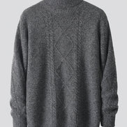 A dark gray cable-knit mock neck sweater displayed on a wooden hanger against a white background.