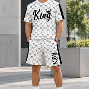 A matching two-piece athletic outfit set consisting of a short-sleeve t-shirt and shorts, both featuring a white base with a black interlocking chain pattern, 