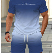 A man wearing a matching blue gradient t-shirt and shorts set with white drawstrings 