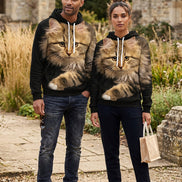 A pullover hoodie featuring a realistic printed image of a fluffy brown tabby cat on the front, with white drawstrings and a white hood lining, 