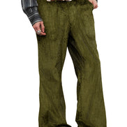 A person wearing olive green corduroy trousers with a brown belt, a patterned waistcoat, and brown shoes, shown from the waist down on a white background.