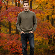 Brown sweater with a zipper being adjusted on a hanger