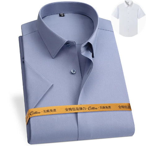 Folded light blue shirt with a white shirt in the corner on a white background