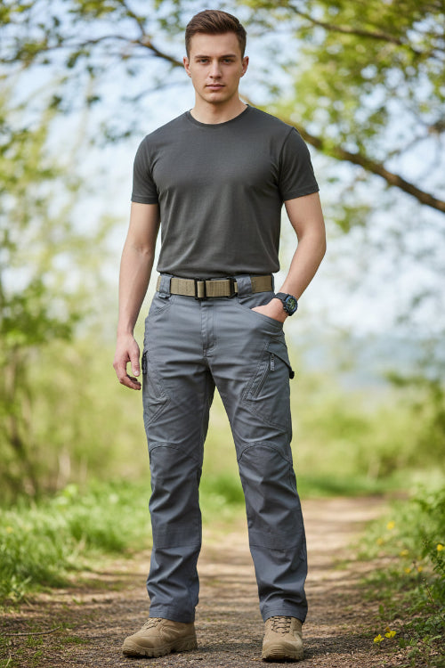 Gray tactical pants with a belt on a white background
