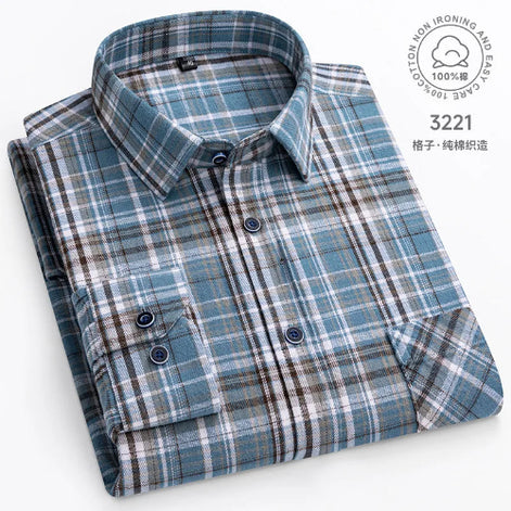 Folded plaid shirt with a label on a white background