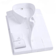 Folded white dress shirt on a white background