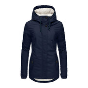 Front view of a navy hooded jacket fully fastened, with a high collar, drawstrings and white fleece-look hood lining against a white background
