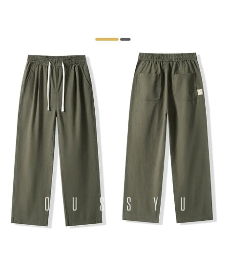 Front and back views of army green straight-leg pants laid flat, showing an elastic waistband, white drawstring, slanted side pockets, and two back patch pockets.