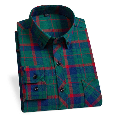 Folded green and red plaid shirt on a white background