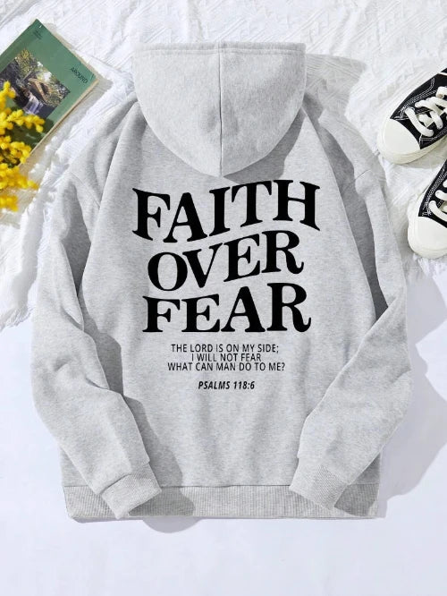Gray hoodie with 'Faith Over Fear' text on a light background