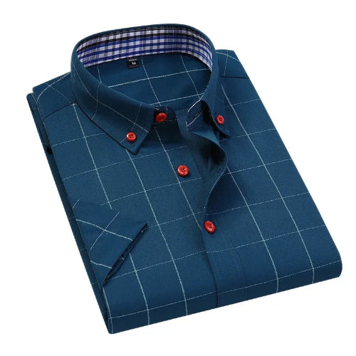 Folded blue checkered shirt with red buttons on a white background
