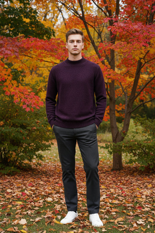 Purple sweater on a hanger with a hand touching it, featuring a 'warm' icon.