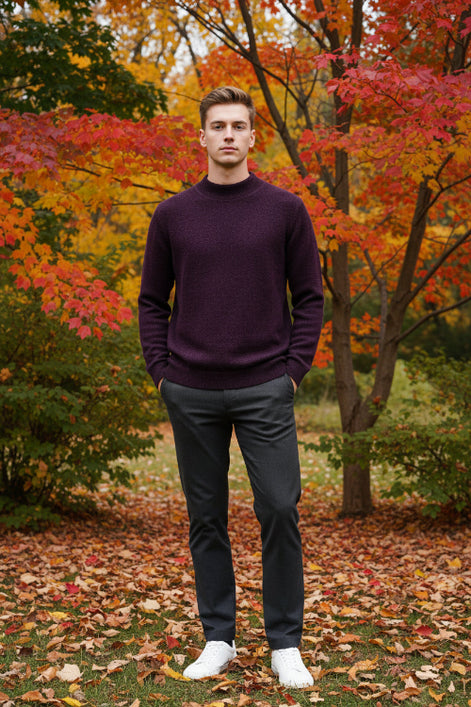 Purple sweater on a hanger with a hand touching it, featuring a 'warm' icon.