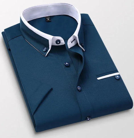 Folded blue dress shirt with white collar on a light gray background