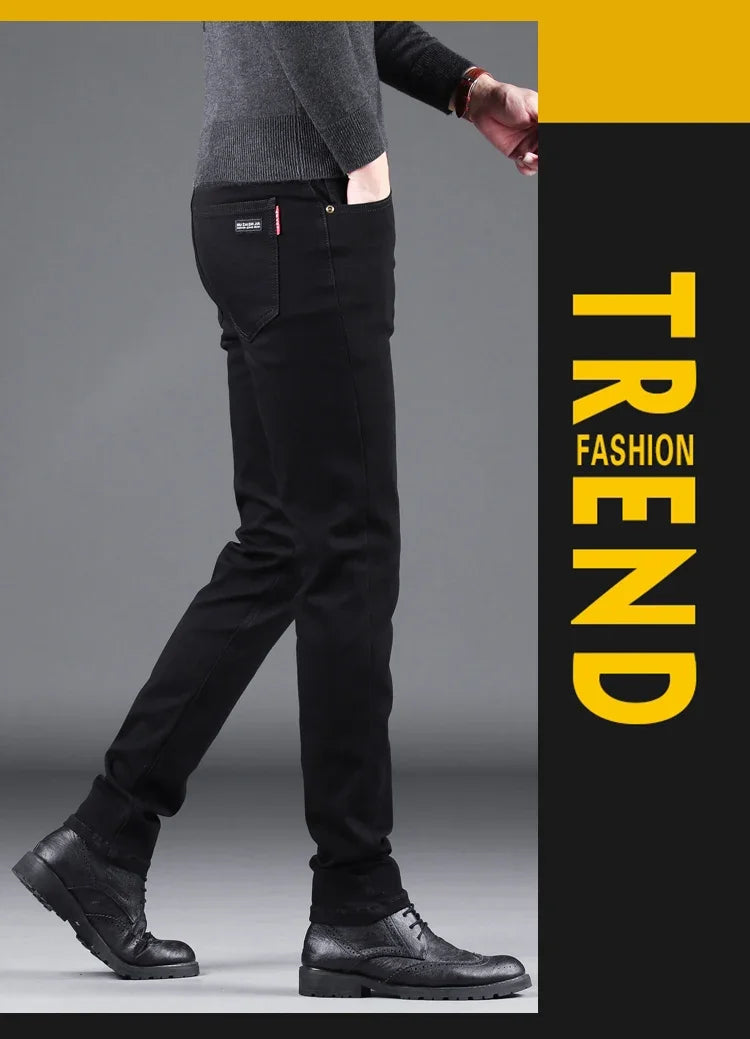 Person wearing black pants with a gray background and 'Trend Fashion' text on the side.