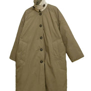Front view of an army green long padded coat showing a buttoned stand collar, front buttons and two angled pockets against a white background