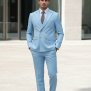 Light blue suit with gold buttons on a white background