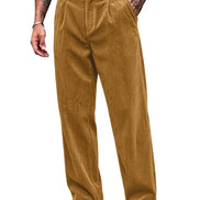 A person wearing wide-leg mustard-brown corduroy pants with a black belt, shown from the waist down against a plain white background.