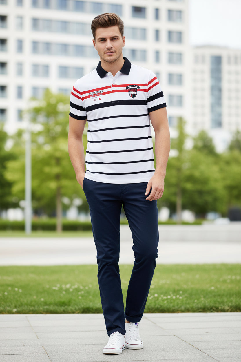 A white short-sleeve polo shirt with horizontal black stripes, red stripes on the upper chest and shoulders, a black collar, and embroidered logos on the chest.