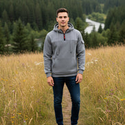 Gray hoodie with a black zipper and red pull tab on a white background
