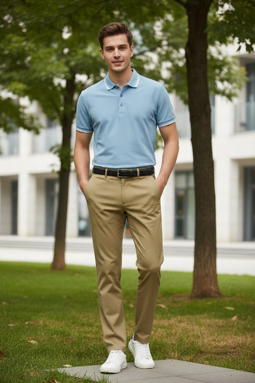 Beige pants with a black belt on a white background