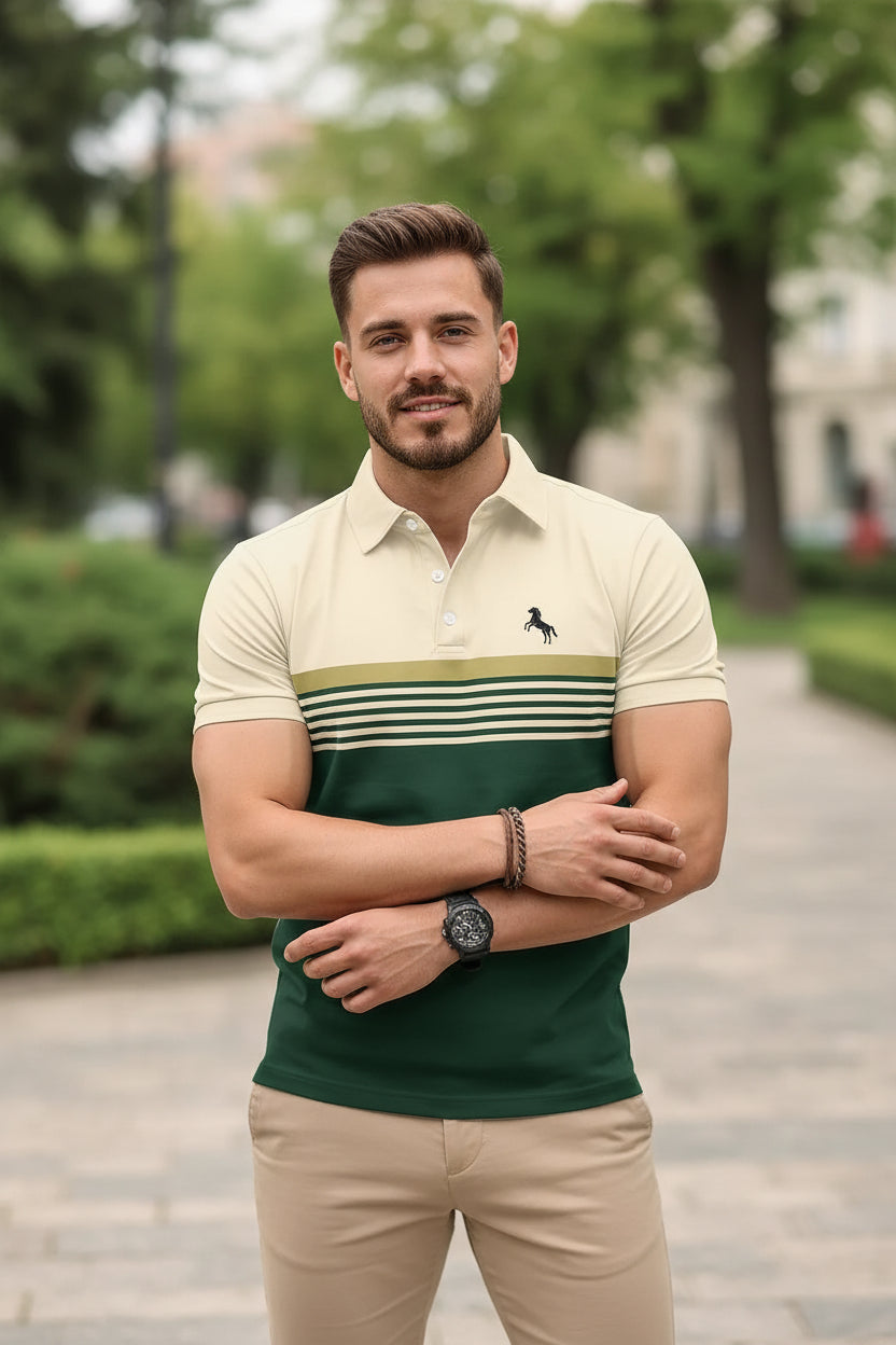 Man wearing a green and beige striped polo shirt with a logo.