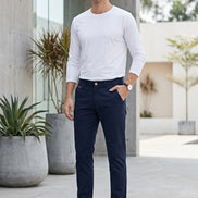 Front and back views of dark navy blue slim-fit chino pants on a white background, showing the front waistband with belt loops and button, front pockets, and the back pockets.