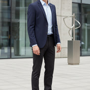 Brown and orange dress shoes on a wooden floor