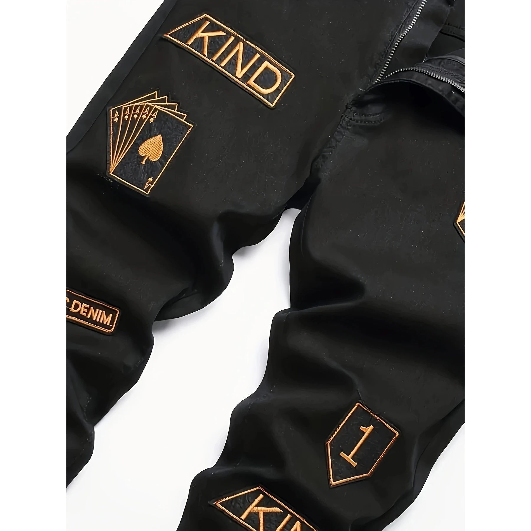 Black jacket with gold patches and text on a white background