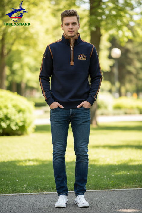 A men's navy blue quarter-zip sweatshirt with brown and red trim, featuring a 'Cruiser Club' graphic on the left chest 