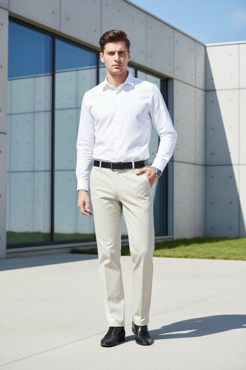 Beige pants worn by a person on a white background