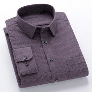 Folded purple checkered shirt on a white background