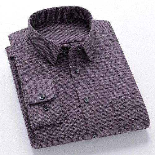 Folded purple checkered shirt on a white background