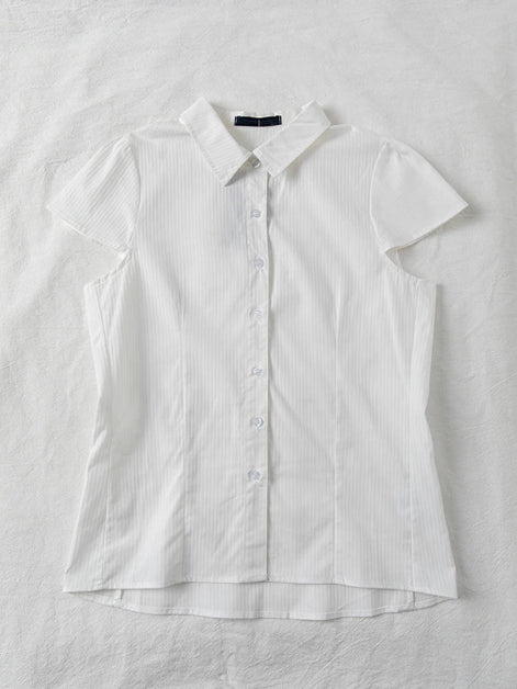 White short-sleeve blouse on a light gray background