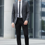 Brown leather dress shoes on a wooden floor