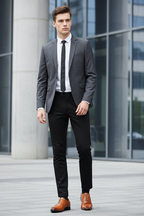 Brown leather dress shoes on a wooden floor