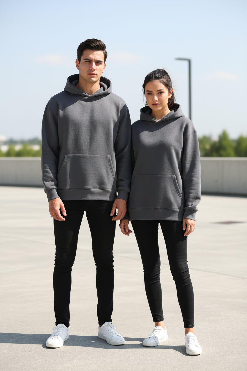 A dark gray pullover hoodie with a front kangaroo pocket, shown flat against a white background with a soft drop shadow.