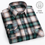 Plaid shirt with green and brown pattern on a white background