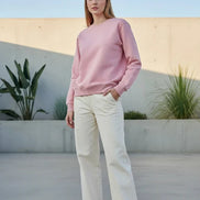 Pink sweatshirt on a white background