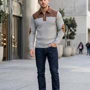 Gray sweater with brown accents on a white background