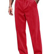 Red corduroy trousers modeled with a black belt and black-and-white shoes against a white background.