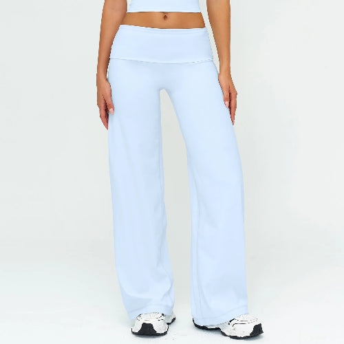 Light blue pants worn by a person on a white background